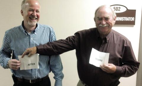Underwood (right) and Tax Commissioner Brian Jackson share a light moment. CONTRIBUTED