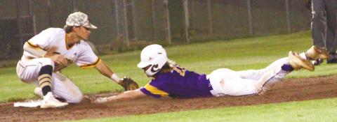 The Greyhounds Austin May comes up an eyelash short on stretching a double into a triple during the state playoffs against Harris County. BRAD HARRISON/Staff