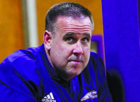 Chad Alligood, who will officially begin as the Greyhounds athletic director next month, surveys the action during Monday’s basketball tournament. BRAD HARRISON/Staff