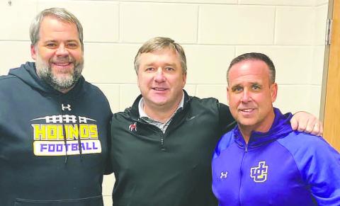 Georgia head coach Kirby Smart, center, poses with Greyhounds head football coach Mike Chastain, left, and Athletic Director Chad Alligood, right, during Friday’s visit. CONTRIBUTED