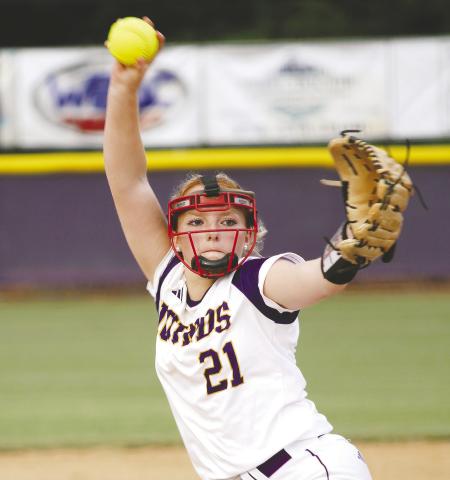 Ansley Pegg (21) rips a pitch toward the plate against Ola. BRAD HARRISON/Staff