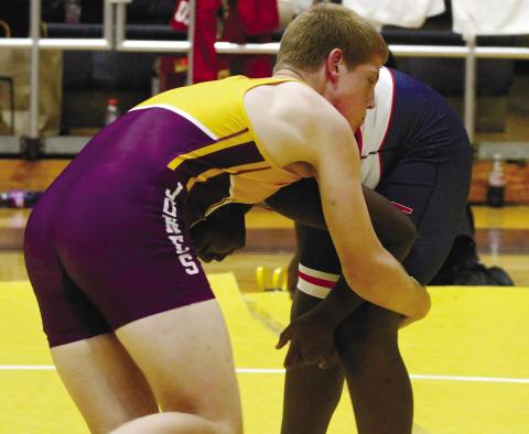 Middle schoolers host takedown tourney, finish second