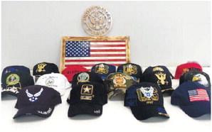 Military service hats on display at a recent Veterans Committee meeting that will be given out Nov. 12. CONTRIBUTED