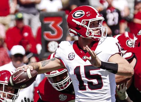 Carson Beck (15) during Georgia Football’s spring game at Sanford Stadium in Athens April 13. Madison Keel/UGAAA