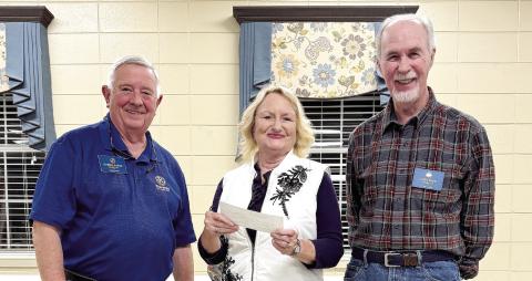 The Kiwanis Club made a donation of $750 to the Jesus Hands ministry which provides meals for children whose families cannot afford proper meals on weekends. President Darrell Partee and Kiwanis member Owen Pruitt made the donation to Patricia Ash, who leads the ministry. CONTRIBUTED