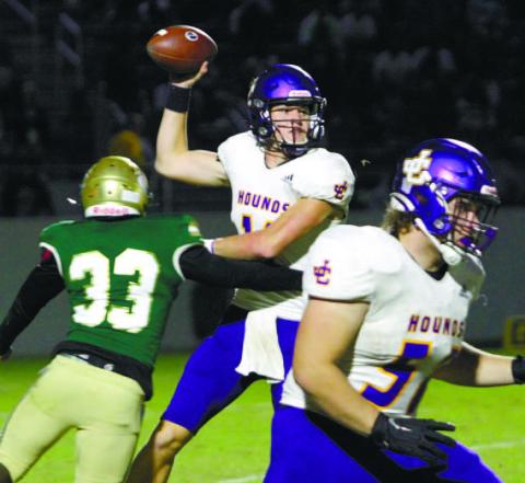 Greyhounds quarterback Judd Anderson heaves a pass downfield during Saturday’s game at Ware County. BRAD HARRISON/Staff