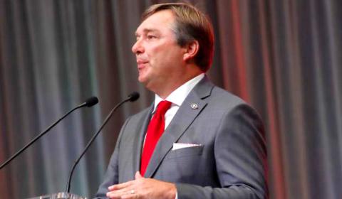 Georgia head coach Kirby Smart speaks at the main stage podium on Wednesday at SEC Media Days. STAFF/Brendan Koerner