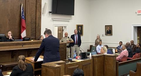 District Attorney T. Wright Barksdale (at podium) speaks to the court during the murder trial against three defendants for the 2017 death of Marquis Hardwick. Presiding over the trial is Superior Court Alison Burleson (far left).