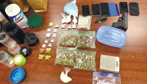 Items seized during Dec. 27 arrest included marijuana, methamphetamine, assorted pills and a firearm. CONTRIBUTED