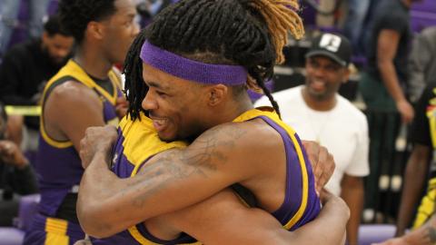 Greyhounds embrace during a historic postseason run.