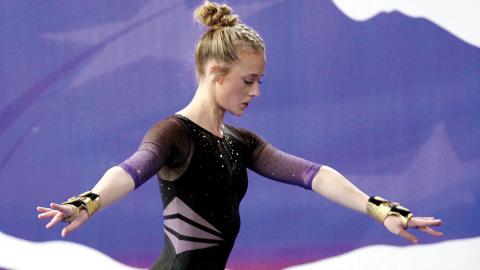 Caroline Barfield’s 9.3 score in the floor routine was a team and season-high mark on Saturday. BRAD HARRISON/Staff