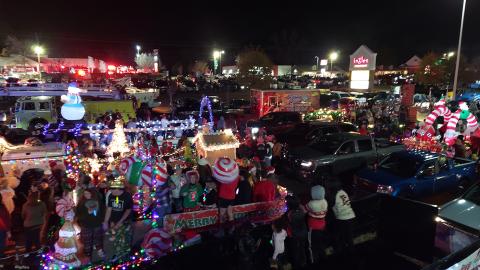 Floats line up in the Ingles parking lot for the 2023 Christmas Parade. Ingles is being honored this year by having its managers serve as grand marshalls.