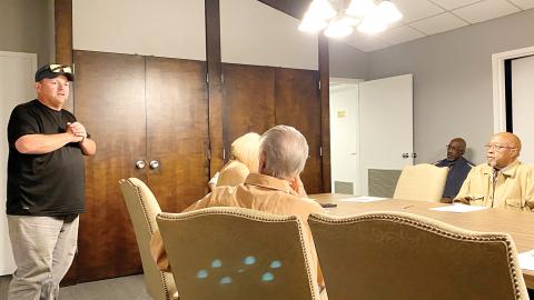 Dairy Queen owner and manager Justin Kelly (left) speaks at Gray City Council’s All Committees meeting Dec. 16. 