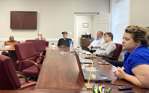 Local leaders gather to decide on steps forward in the community branding process.