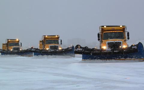 Snow is removed from a runway at Hartsfield-Jackson International Airport.