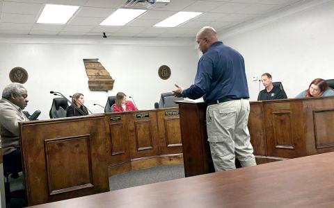 Former chief appraiser Tony George stands in front of the Jones County Board of Tax Assessors.