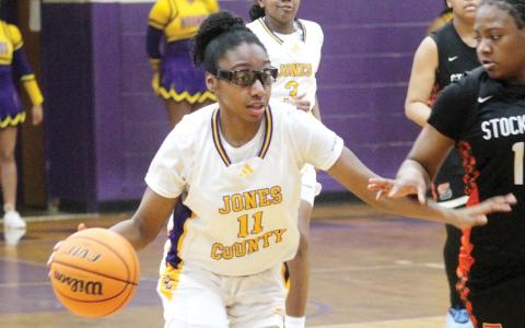 Autumn Coleman beats the defensive pressure to get the ball up the floor earlier this month..
