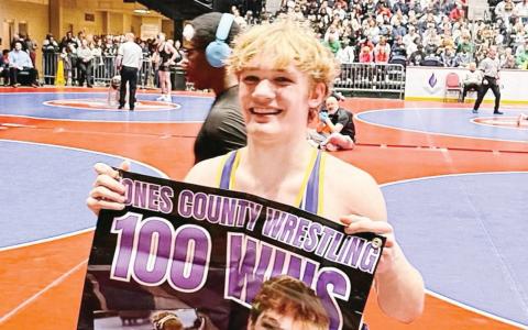 Arrie Martin celebrates after a state tournament in which he got his 100th career win on the way to a third-place finish in 2024.