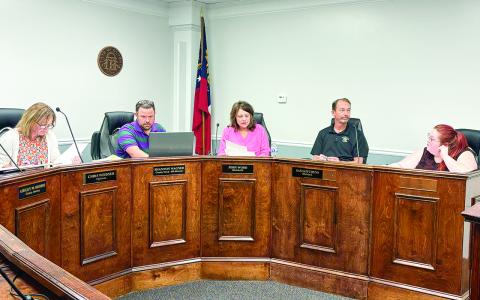 The Board of Tax Assessors currently consists of three members, but county commissioners plan to appoint two additional member to complete the board soon. DEBBIE LURIE-SMITH/Staff