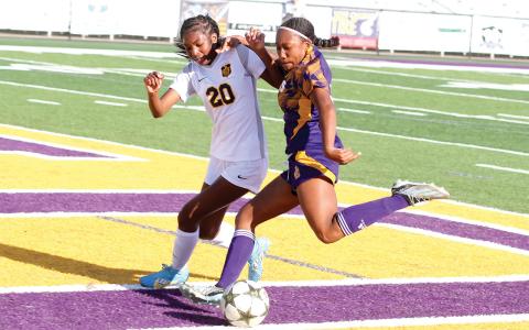 Emory Sanford fights for the ball against Eagles Landing. She had a combined 10 goals in both of last week’s victories. (Brad Harrison/Staff)