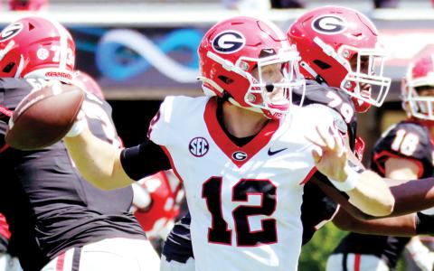 Ryan Puglisi attempted a combined 49 passes during Saturday’s G-Day scrimmage. LANCE McCURLEY/Staff