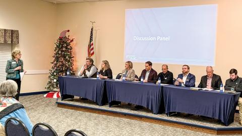 Laura Mathis, Middle Georgia Regional Commission director, moderates the panel of experts at the Dec. 18 information session. DEBBIE LURIE-SMITH/Staff