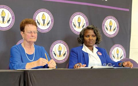 Board of Education Chair Ginger Bailey (left) and challenger Marilyn Norfleet answer questions in the community room at JCHS.
