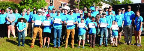 Members of Haddock Baptist Church are ready to go to work during the April 27 day of service event. CONTRIBUTED PHOTOS