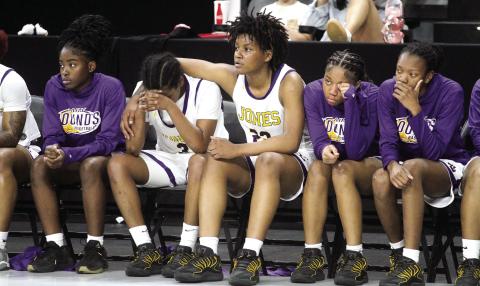 The Lady Geyhounds console one another as time runs off the clock at the end of Saturday’s state semifinal loss against Kell. BRAD HARRISON/Staff