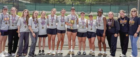 The Lady Greyhounds pose with the region championship trophy and first-place medals after last week’s region tournament title. CONTRIBUTED