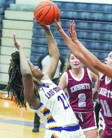 Liberty Pennamon crashes the boards for a defensive rebound on Thursday. BRAD HARRISON/Staff