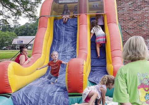 The big bouncy slide was a big hit at the June 5 kickoff to the summer reading program at the Jones County Library. CONTRIBUTED