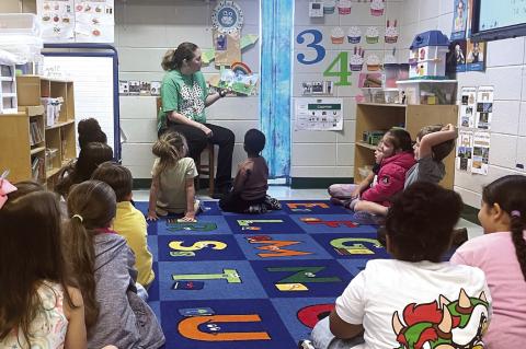 Students learn about how rainbows are formed. BETHANY TAPEE/Staff