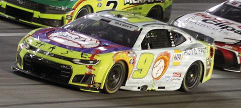 Chase Elliott battles for postion coming off turn four during Sunday’s Quaker State 400. He led twice for five laps. BRAD HARRISON/Staff