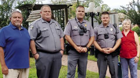 Pastor Ricky Feagin, GPD Officer Brent Zimmerman, Capt. Eric Maynard, Officer Daniel Pointer and ministry leader Debra Hall at the 9/11 lunch