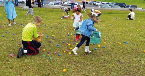 All ages appeared to enjoy the community Easter egg hunt March 23 hosted by Bradley Baptist Church. The event was coordinated by children’s director Bethany Herin, and all were invited back to celebrate Easter Sunday this weekend. PHOTOS BY BRANDY ROUND