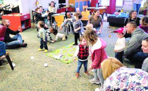 A snowball fight taking place during Wiggle Worms at the Jones County Library. CONTRIBUTED