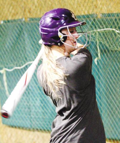 The Lady Hounds workout on Monday included time in the hitting cages. BRAD HARRISON/Staff