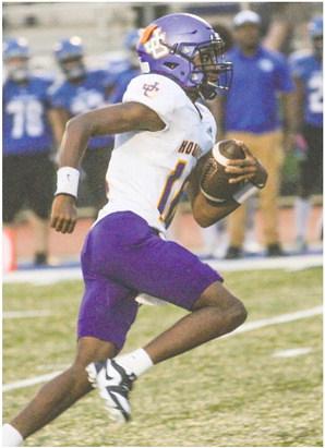 Greyhounds quarterback Devin Edmonds gets away to pick up yardage downfield against Locust Grove. BRAD HARRISON/Staff