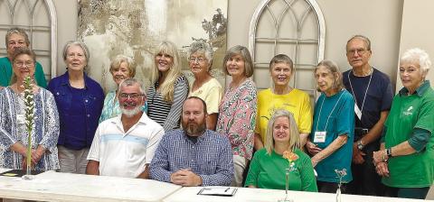 Jones County Commission Chairman Chris Weidner (seated left) and Gray Mayor Pro Tem James Collins sign a joint proclamation June 6 for Gray Garden Club members in honor of National Garden Week June 4 10. CONTRIBUTED
