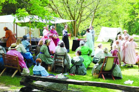 Ladies at Old Clinton War Days prepare for the event with different activities throughout the day. FILE PHOTO