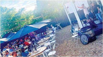 Entertainment is enjoyed during Fridays on Main in downtown Gray. CONTRIBUTED