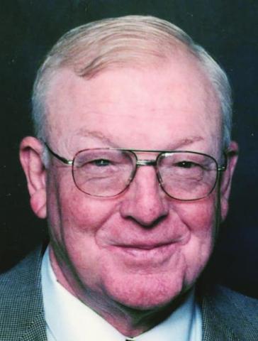 Charles E. White