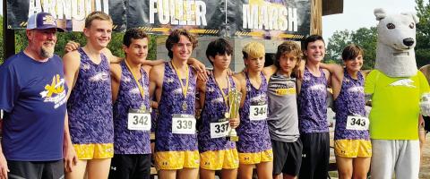 The Greyhounds pose after claiming first overall at Saturday’s Rancher’s Release The Hounds Invitational. CONTRIBUTED