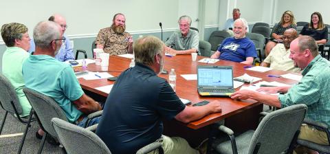 Jones County Commissioners and Gray Council members are all smiles at the July 14 joint meeting. DEBBIE LURIE-SMITH/Staff