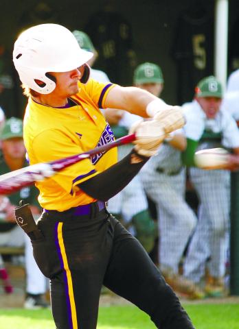 Tucker Maddox lines a pitch into play during Monday’s second game. BRAD HARRISON/Staff