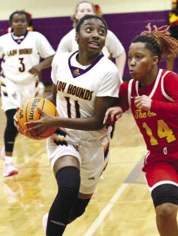 Lady Greyhounds freshman guard Autumn Coleman drives in for two points in the second half against Northeast on Saturday. BRAD HARRISON/Staff