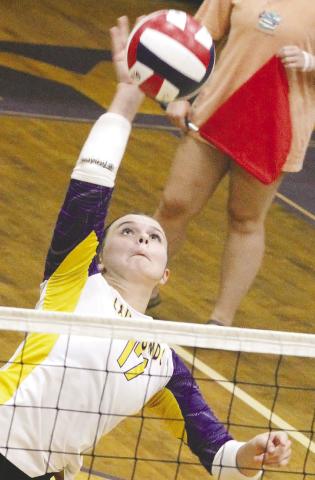 Strong play at the net was one of many reasons for the Lady Hounds sweep last Thursday. BRAD HARRISON/Staff
