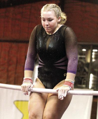 Chloe Clark’s performance on Saturday included a score of 8.5 on the beam, one of three scores needed to qualify for the state meet later this season. BRAD HARRISON/Staff