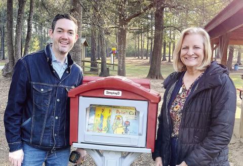 Matthew Forest from GCSU and Jones County Library Branch Manager Julie King with the county’s newest Little Library located in Haddock Park. The Little Library is courtesy of GCSU and Tri-County EMC and features free books for local readers to take home as well as a place to add a book for someone else to enjoy. CONTRIBUTED